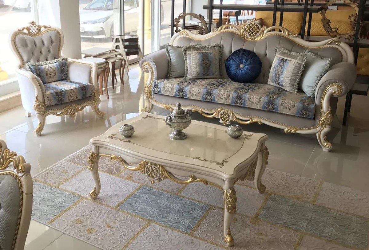 Luxury baroque coffee table white / gold 118 x 87 x H. 50 cm - solid wood living room table - furniture in the baroque style